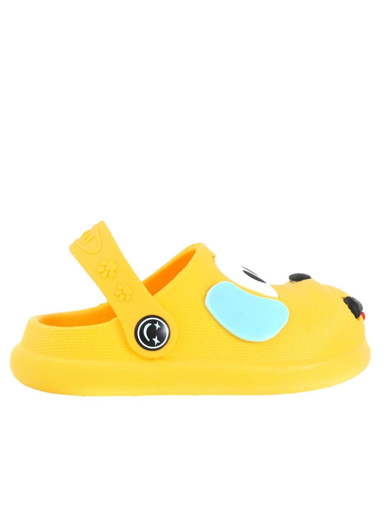 Yellow puppy pattern clogs for boys by Yellow Bee, overhead view.