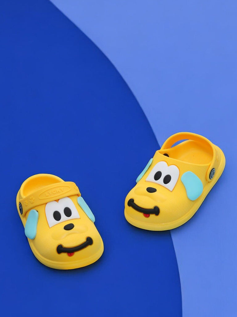 Yellow puppy pattern clogs for boys on a blue and yellow background.