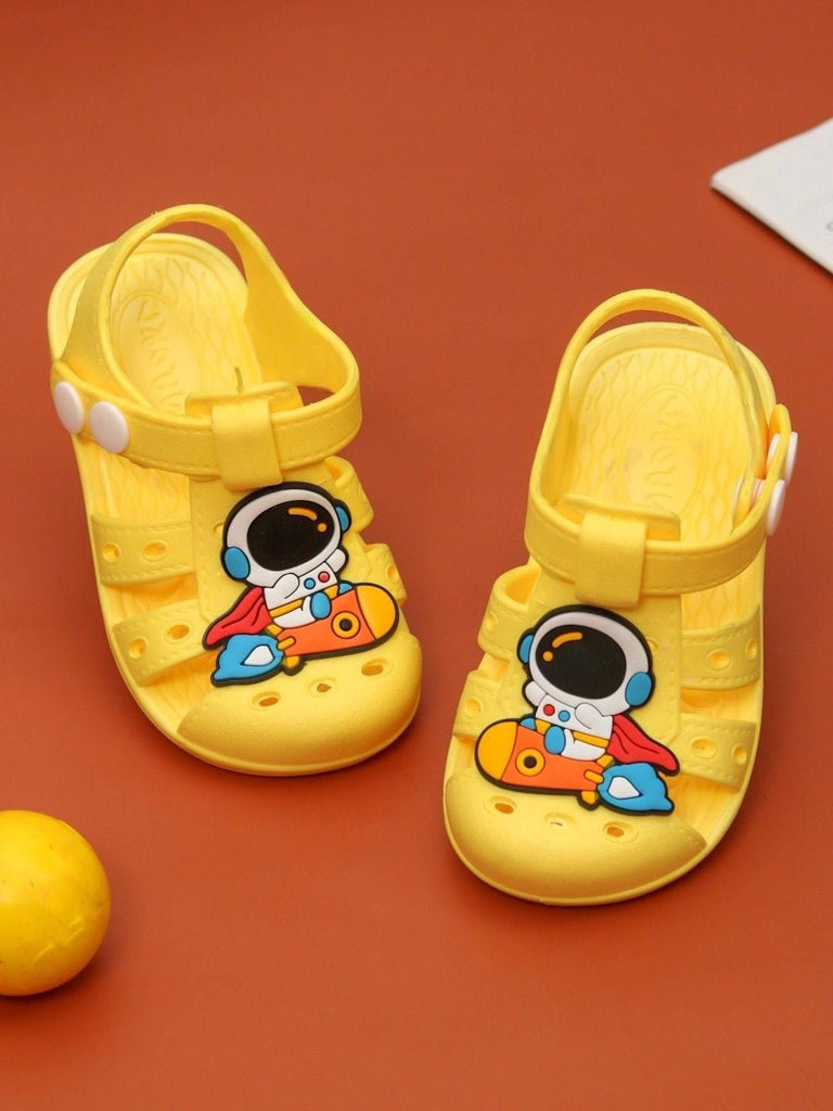 Yellow Astronaut Rocket Sandals for Boys displayed with space-themed accessories, perfect for imaginative play.