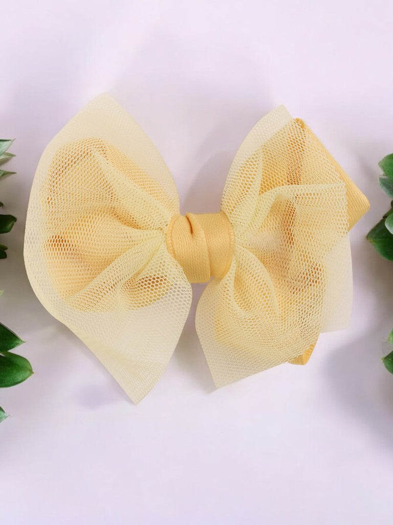 Creative view of the Sunshine Bliss Tulle Hair Bow for Girls in yellow.