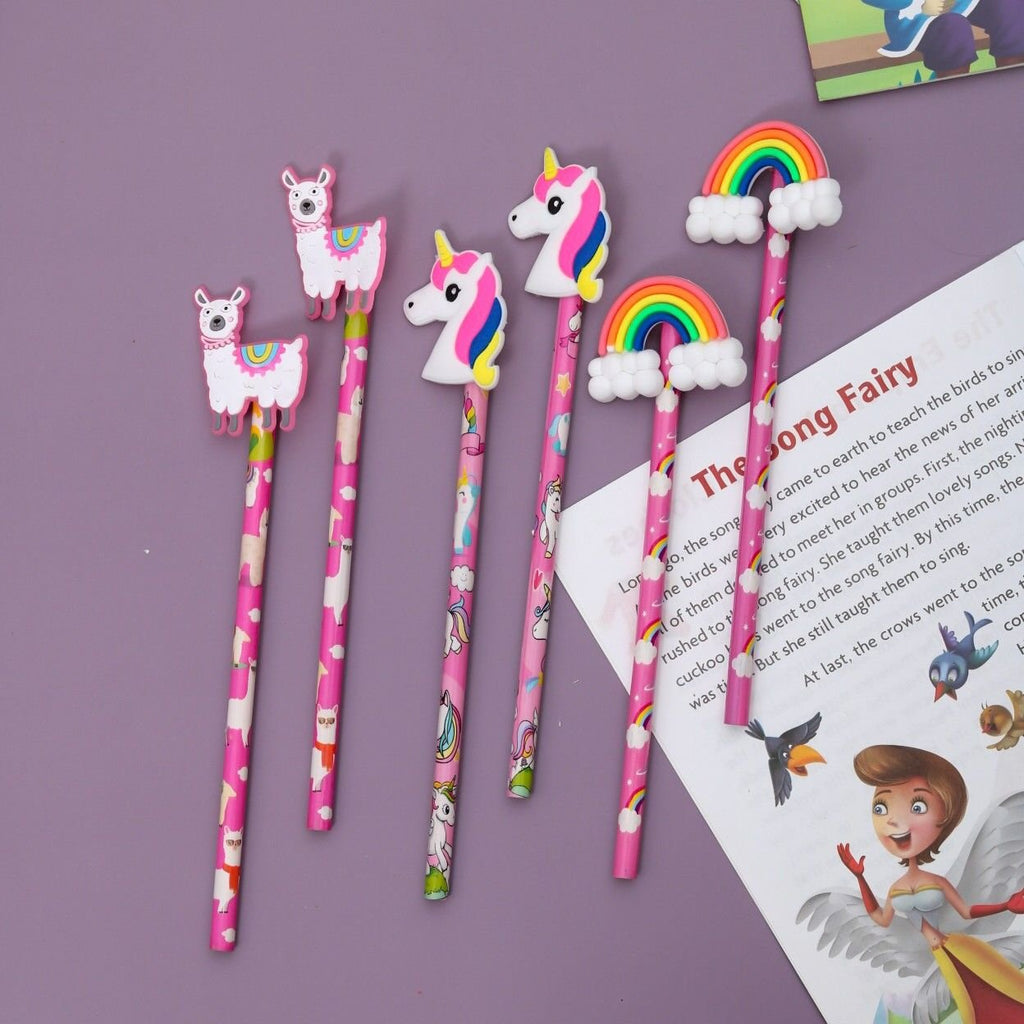 A colorful array of Yellow Bee pencils featuring rainbow, llama, and unicorn toppers laid out on a purple background.