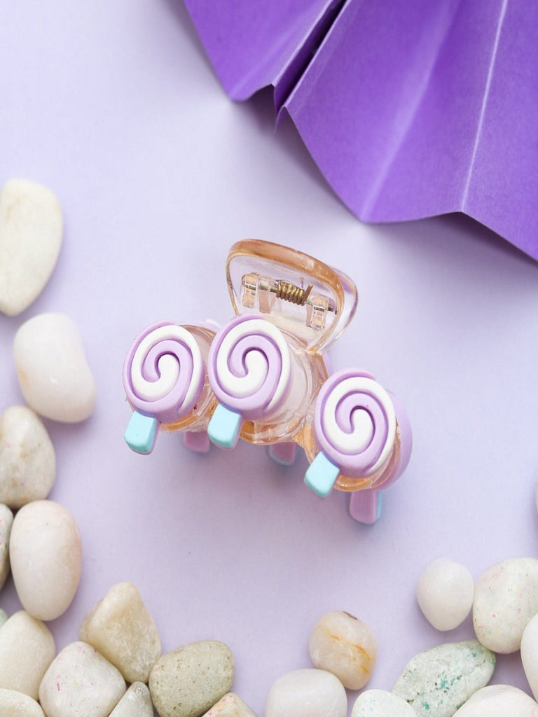 Creative view of Sweet Lollipop Inspired Swirl Hair Claw Clip in purple with pastel swirl design by Yellow Bee.