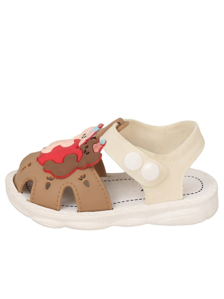 Side angle view of Teddy Bear Hug Sandals, highlighting the comfortable fit and adorable accents