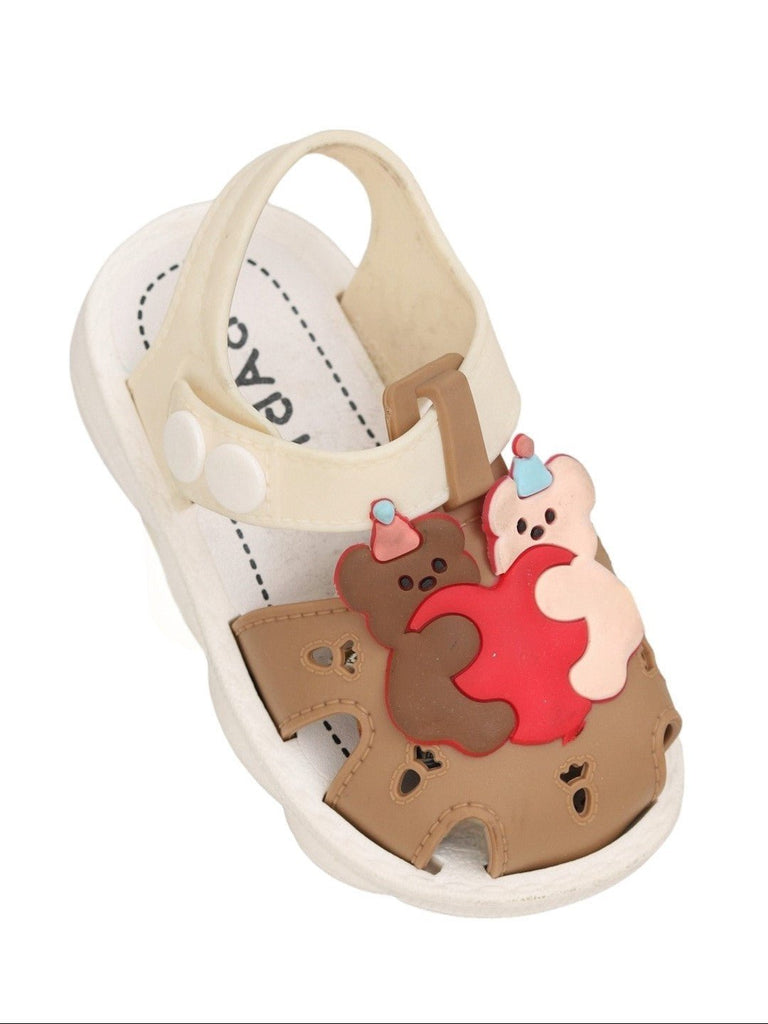 Side view of Teddy Bear Hug Sandals, displaying the detailed design and adjustable straps