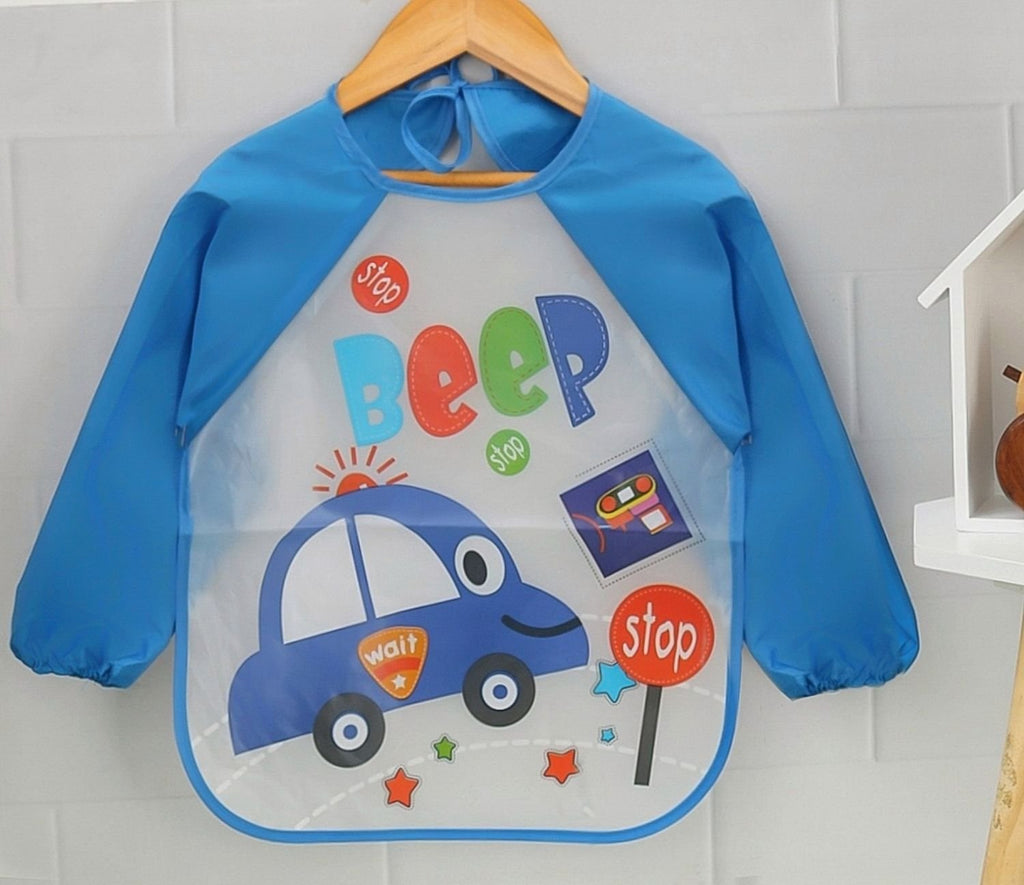 Display setup of Tiny Tots Traffic Long-Sleeve Waterproof Baby Bib showcasing the car print and colors.