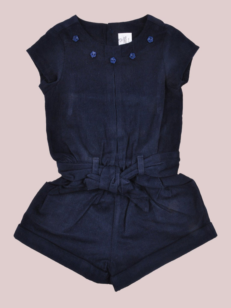 Front view of the ToffyHouse Baby Girls' Navy Blue Corduroy Romper with Button and Bow Details.