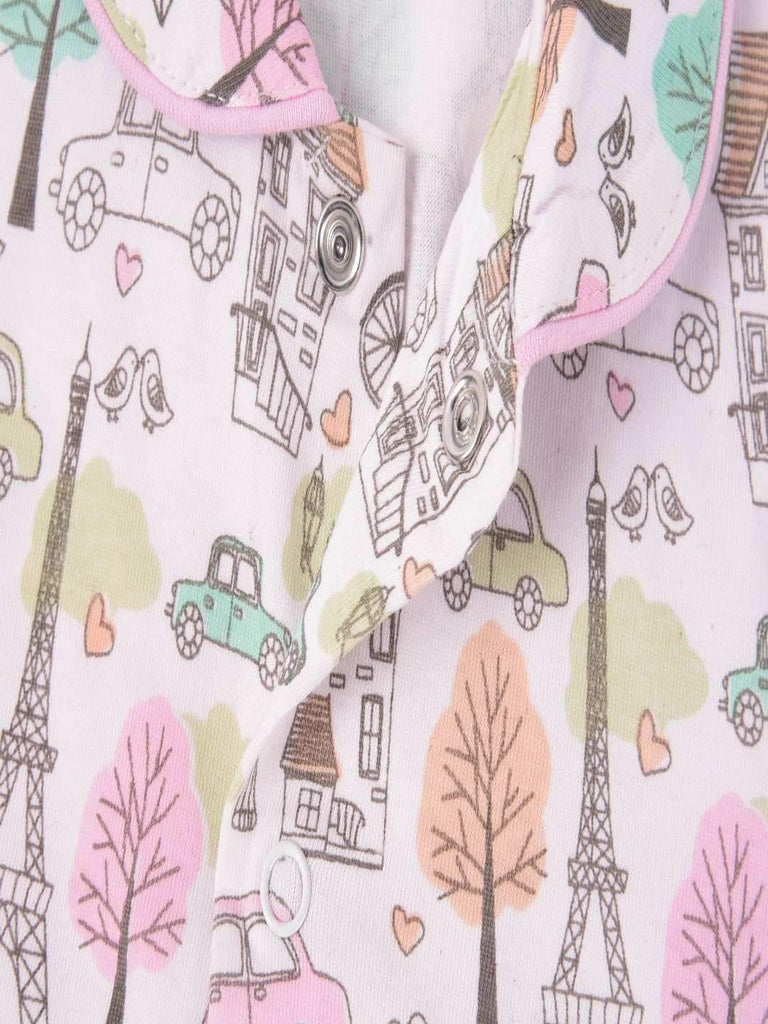 Close-up view of the button detailing on the Toffyhouse Girls' Printed Shirt with Full Sleeves.