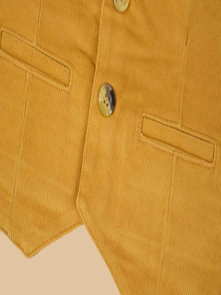 Bottom view of a golden corduroy vest, showcasing two buttons and welt pockets.