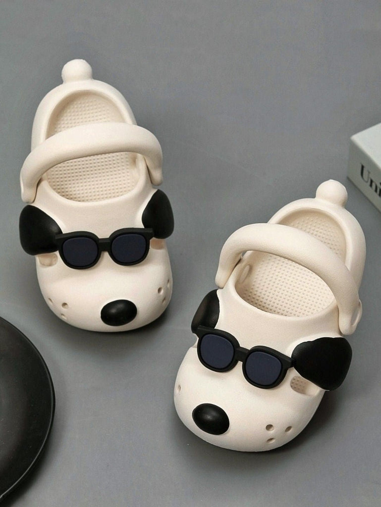 Creative display of the Trendy Pup Boy's Clogs, emphasizing the stylish and fun design in a playful setting.