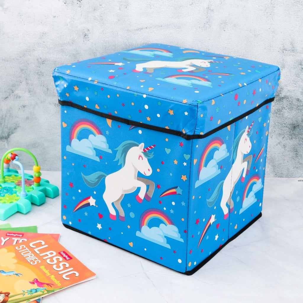 Front view of Yellow Bee Unicorn Multi-Functional Folding Storage Box with blue background and whimsical unicorn prints.