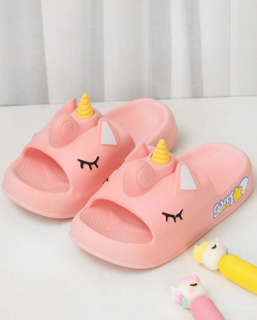 Creative display of the Peach Unicorn-Themed Comfort Slides for Girls by Yellow Bee