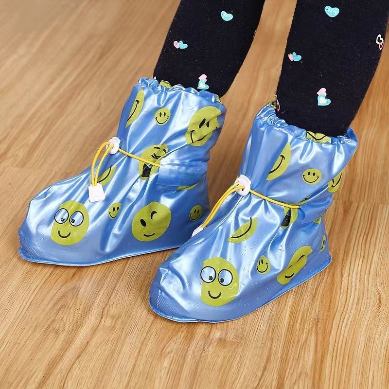 Creative display of Yellow Bee Smiley Face Waterproof Rain Shoe Covers for Boys showing their playful design.