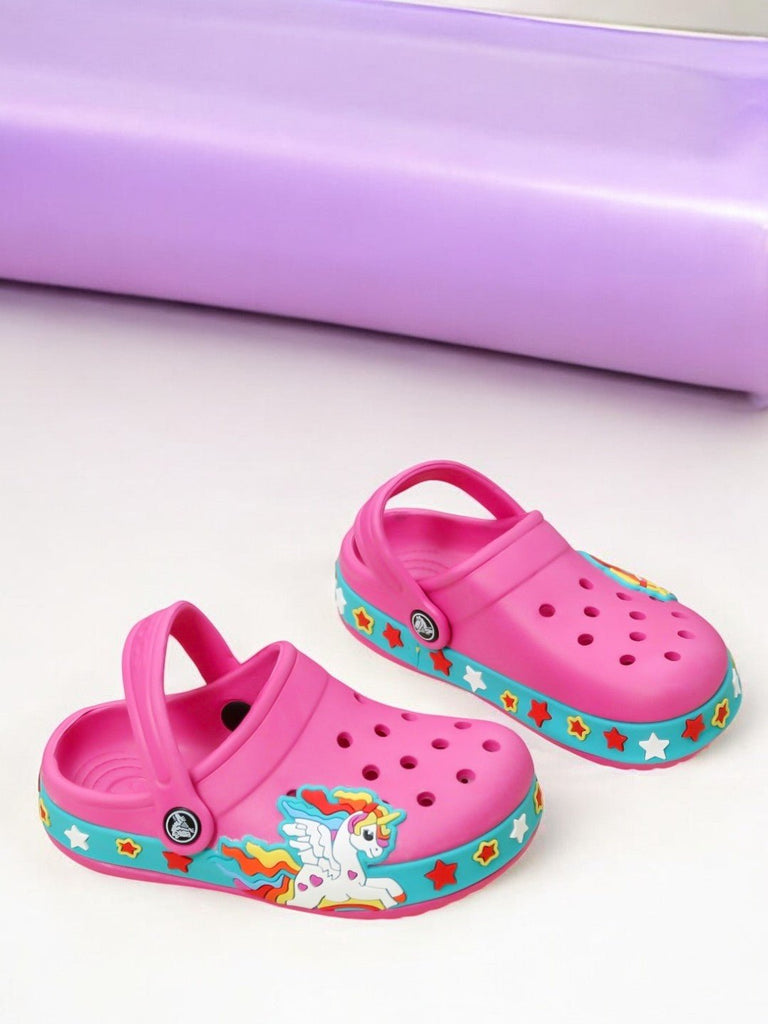 Pair of fuchsia kids' clogs with a unicorn and stars design, ideal for imaginative play