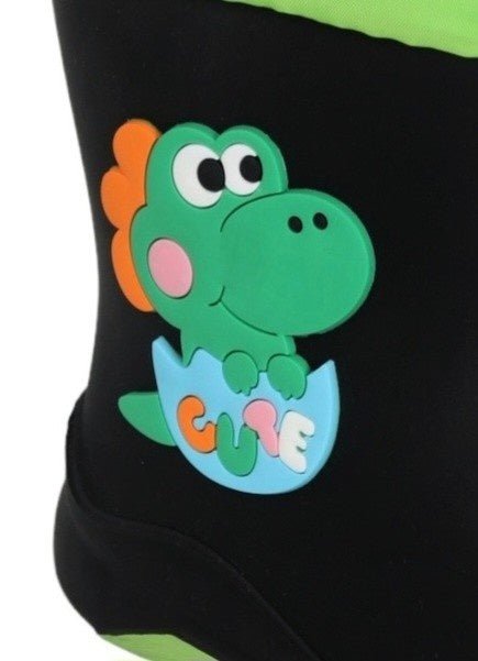 Close-up view of the green dinosaur design on Yellow Bee's boys' rain boots