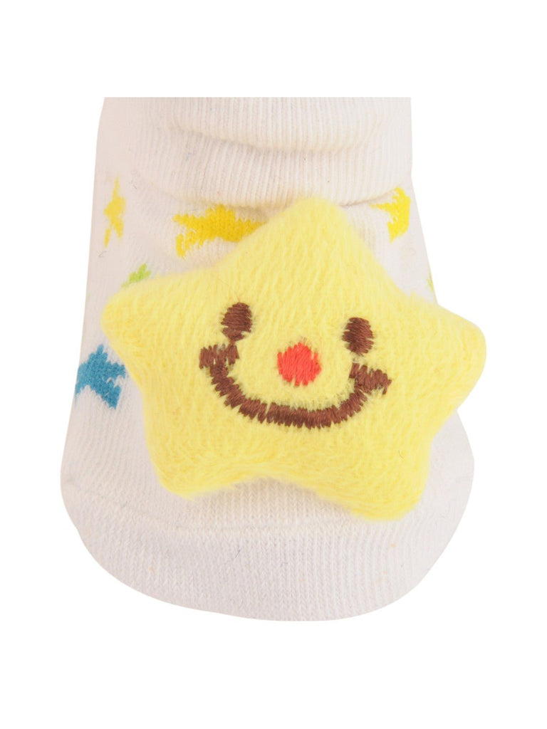 Close-up view of White Baby Socks with Smiling Star and Colorful Starry Design