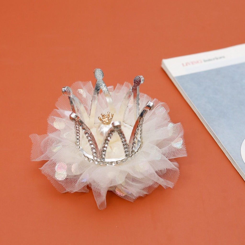 Yellow Bee's White Pearl Crown Hair Clip displayed creatively, ideal for adding a royal touch.