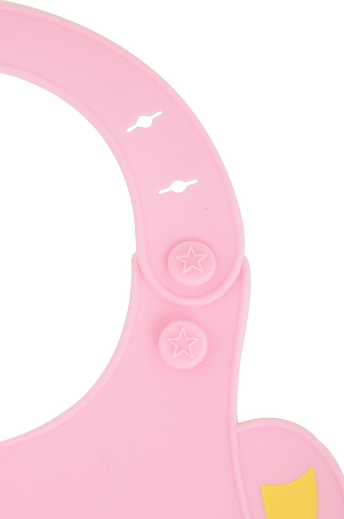 Detailed view of the button closure on the Yellow Bee Easy Clean Silicone Bib with Crumb Collector, Pink.