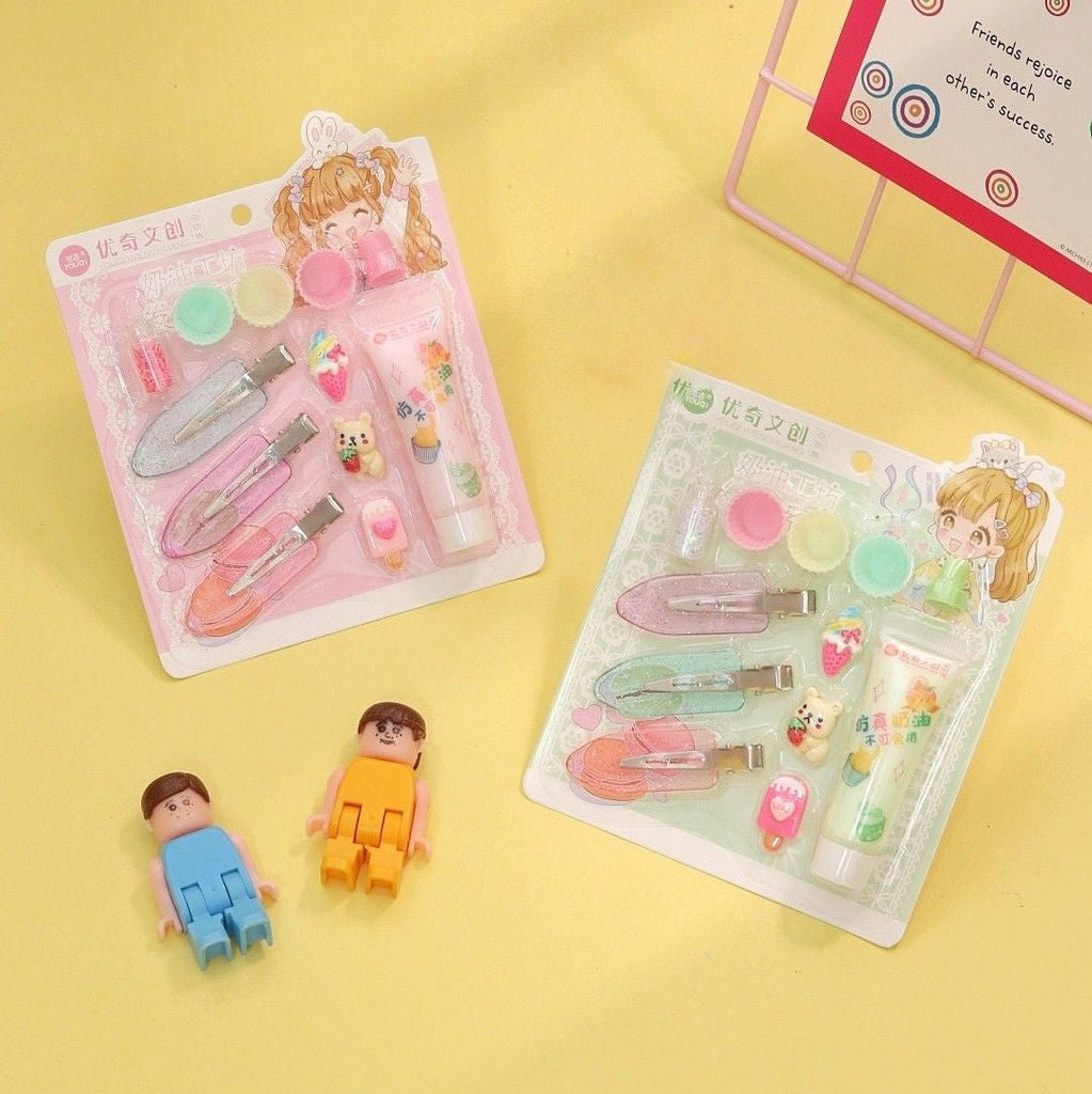 Display of Yellow Bee DIY Resin Art Kits in Green and Pink, complete with glitter clips and tools.