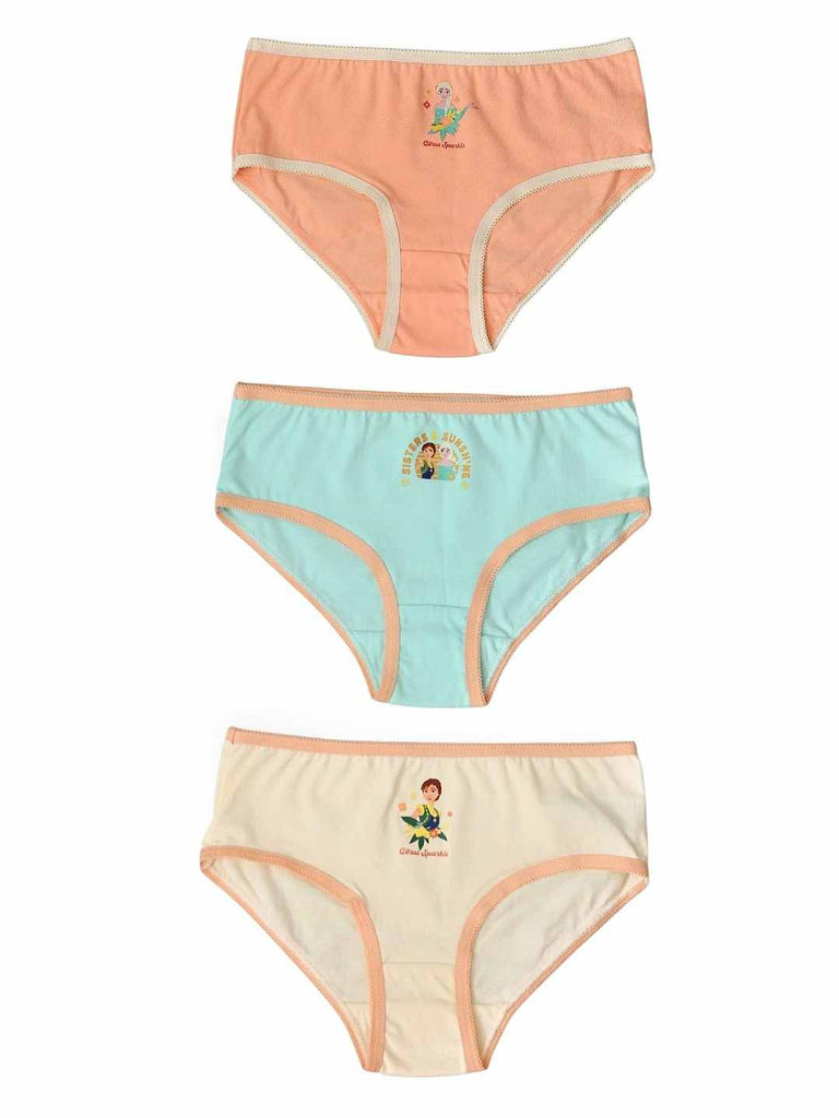 Flat‑lay of three Disney Frozen girls’ cotton briefs on light blue background.