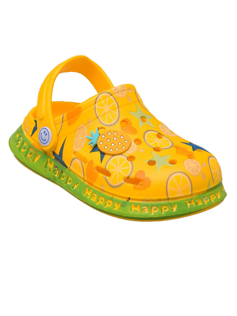 yellow-kids-clogs-with-citrus-fruit-and-star-patterns-angle view..