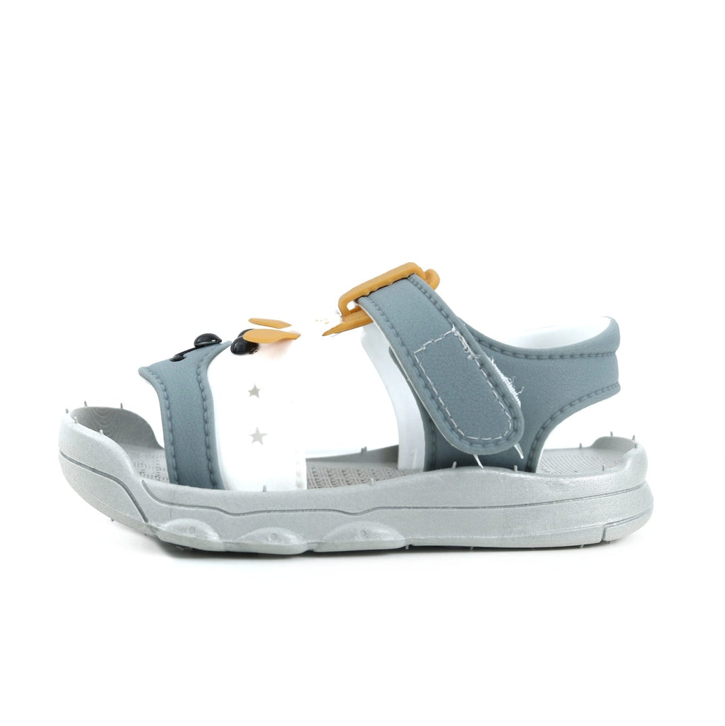 Top view of charming toddler sandals featuring a grey puppy motif