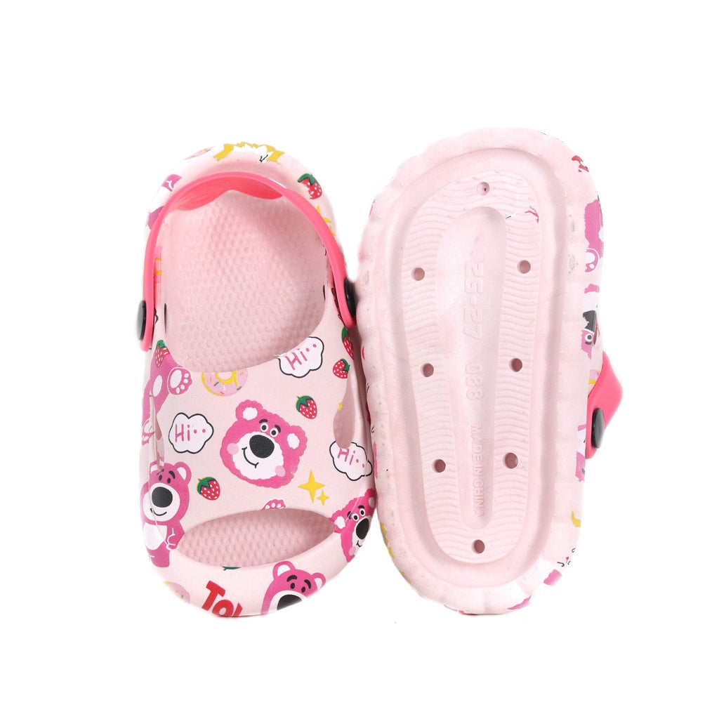 Bottom view of pink bear and strawberry printed sandals showcasing the sole pattern.