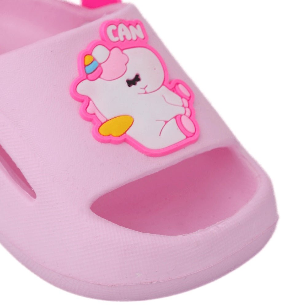 Close-up of the cute unicorn decoration on pink toddler sandals