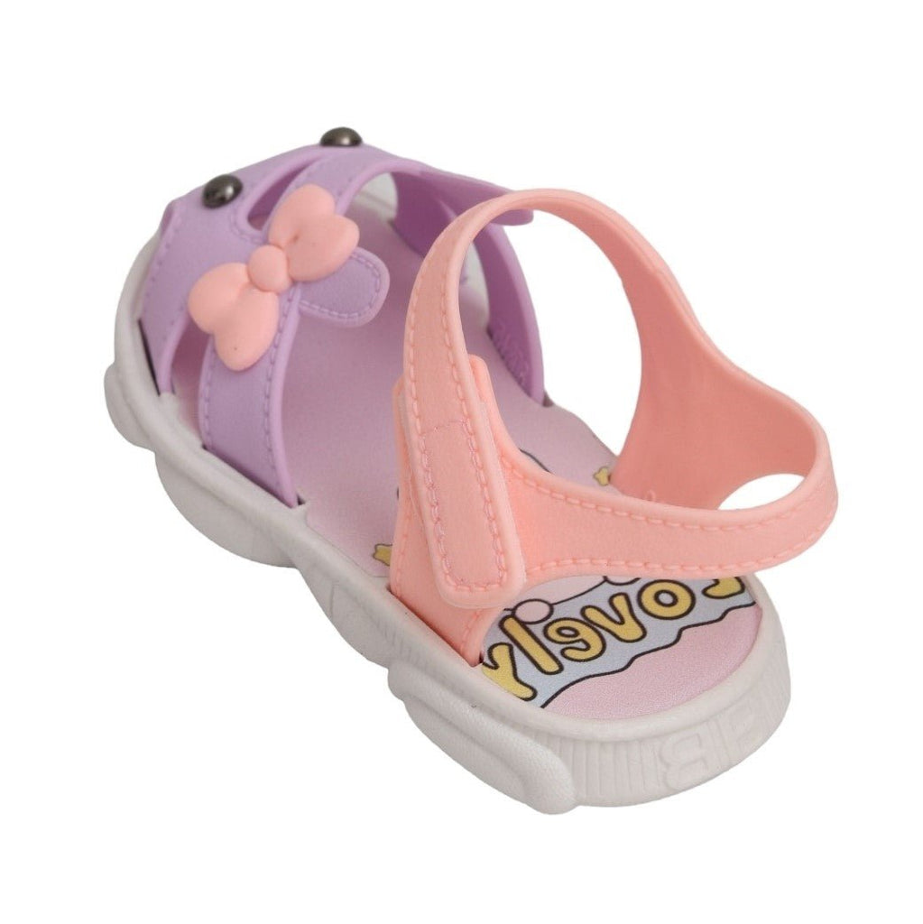 Side view of a toddler's purple bunny sandal, showcasing its secure fit and playful design.