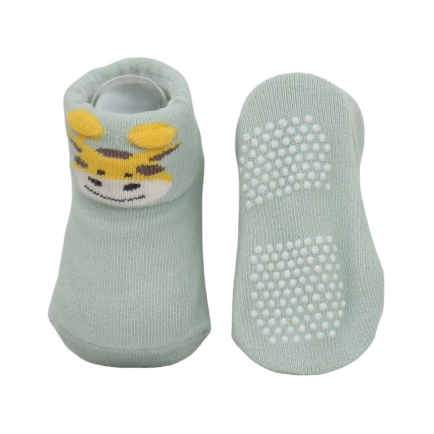 Soft and secure baby boy socks adorned with an adorable motif, complete with anti-skid soles.