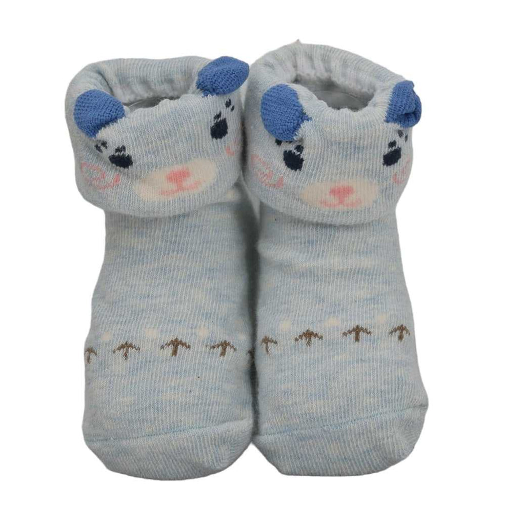 Baby blue anti-skid socks with puppy face for infants by Yellow Bee.