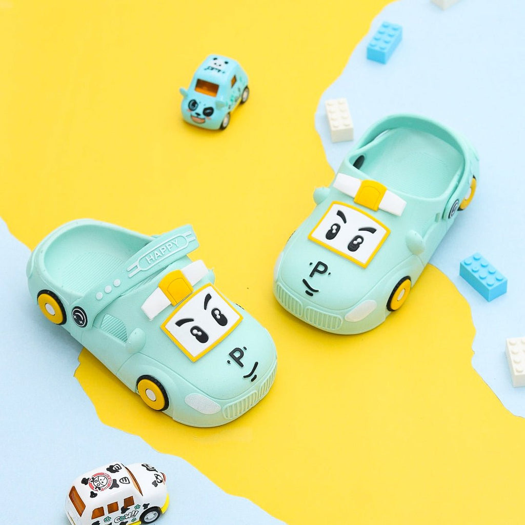 Aqua car pattern clogs for boys on a playful background.