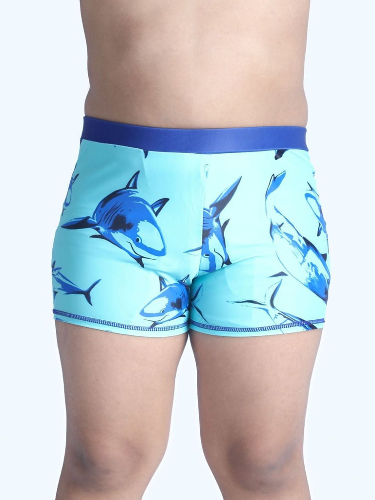 Detail of aqua shark print on boys' swim shorts by Yellow Bee