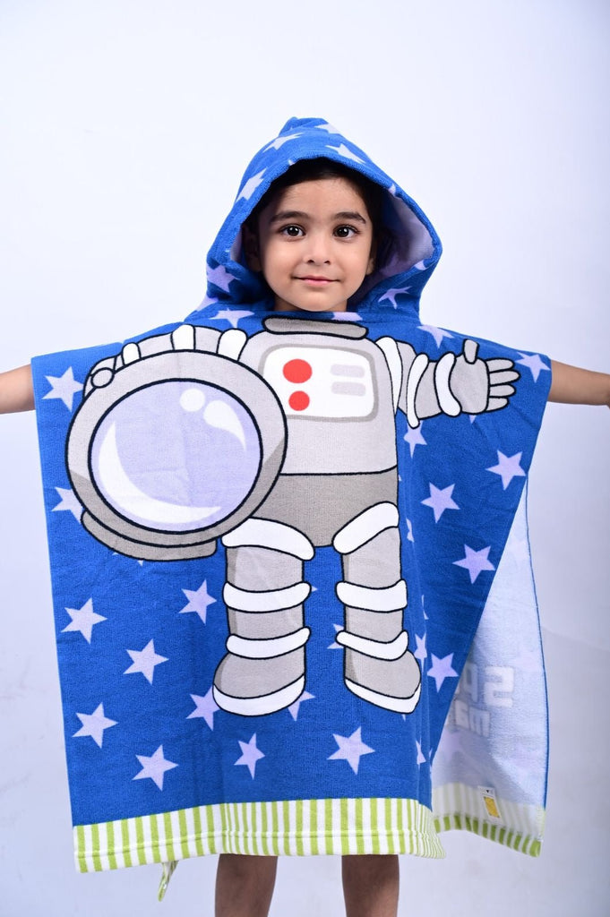 Close-up of the astronaut-themed poncho towel detailing UV protection and quick-drying fabric.