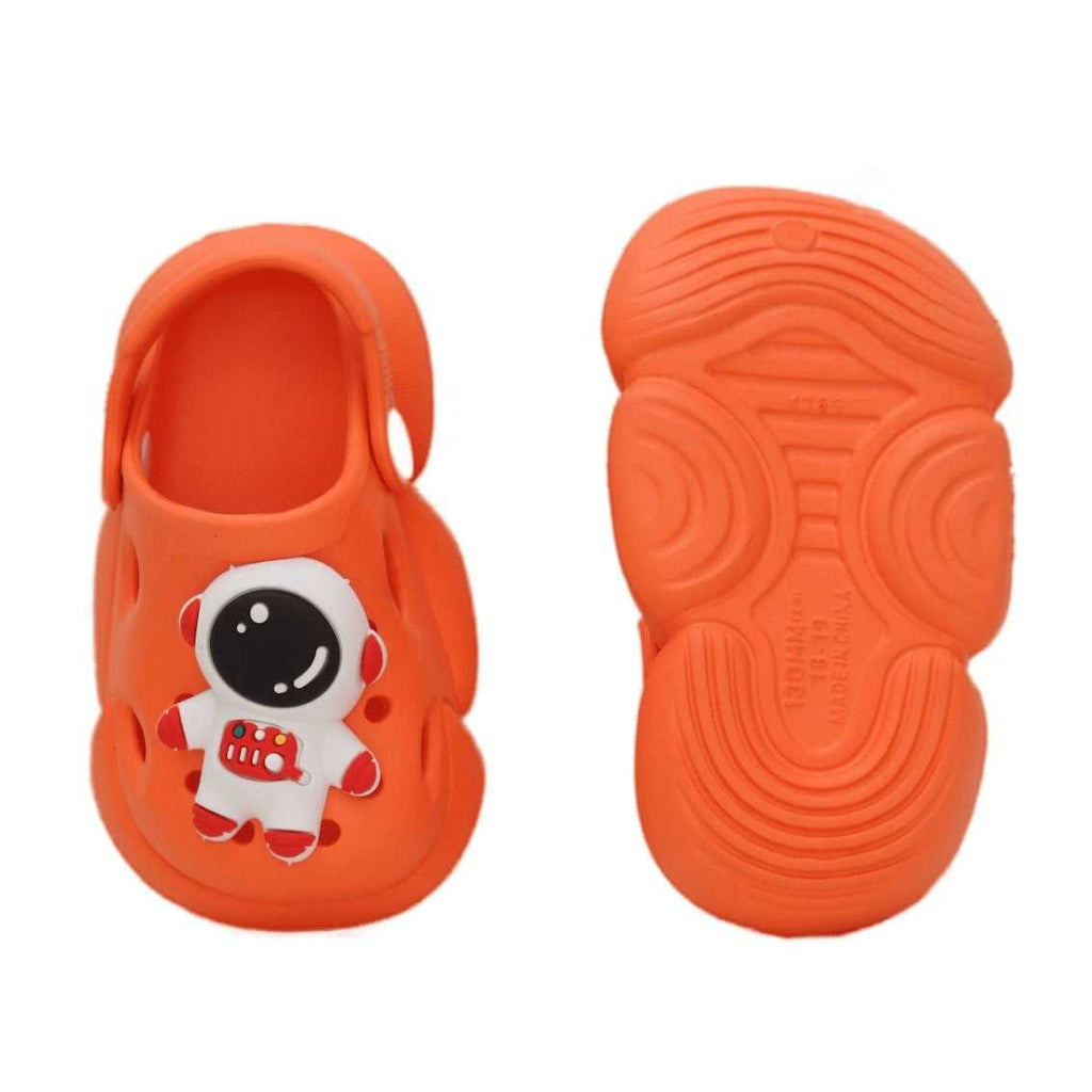  orange clog with astronaut design, showcasing the fun motif and strap detail.
