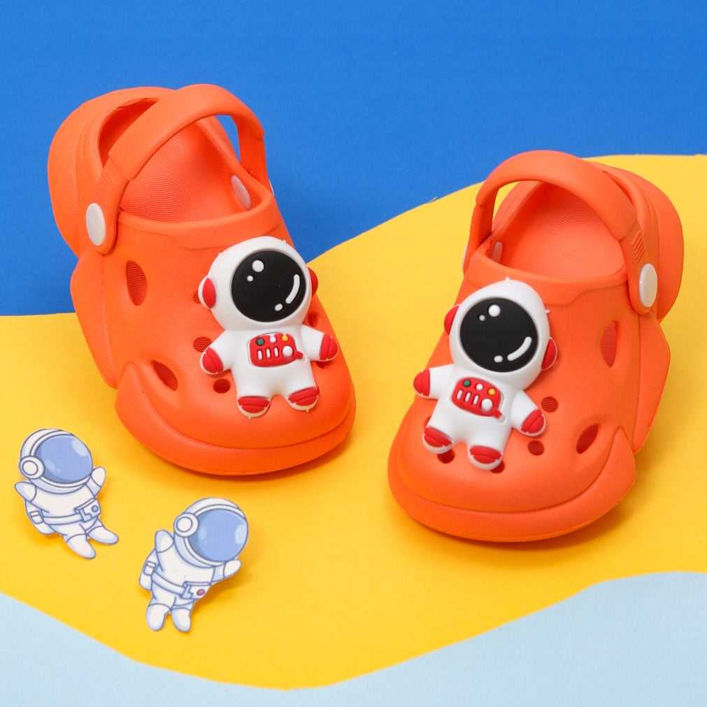 Pair of orange astronaut-themed clogs for children