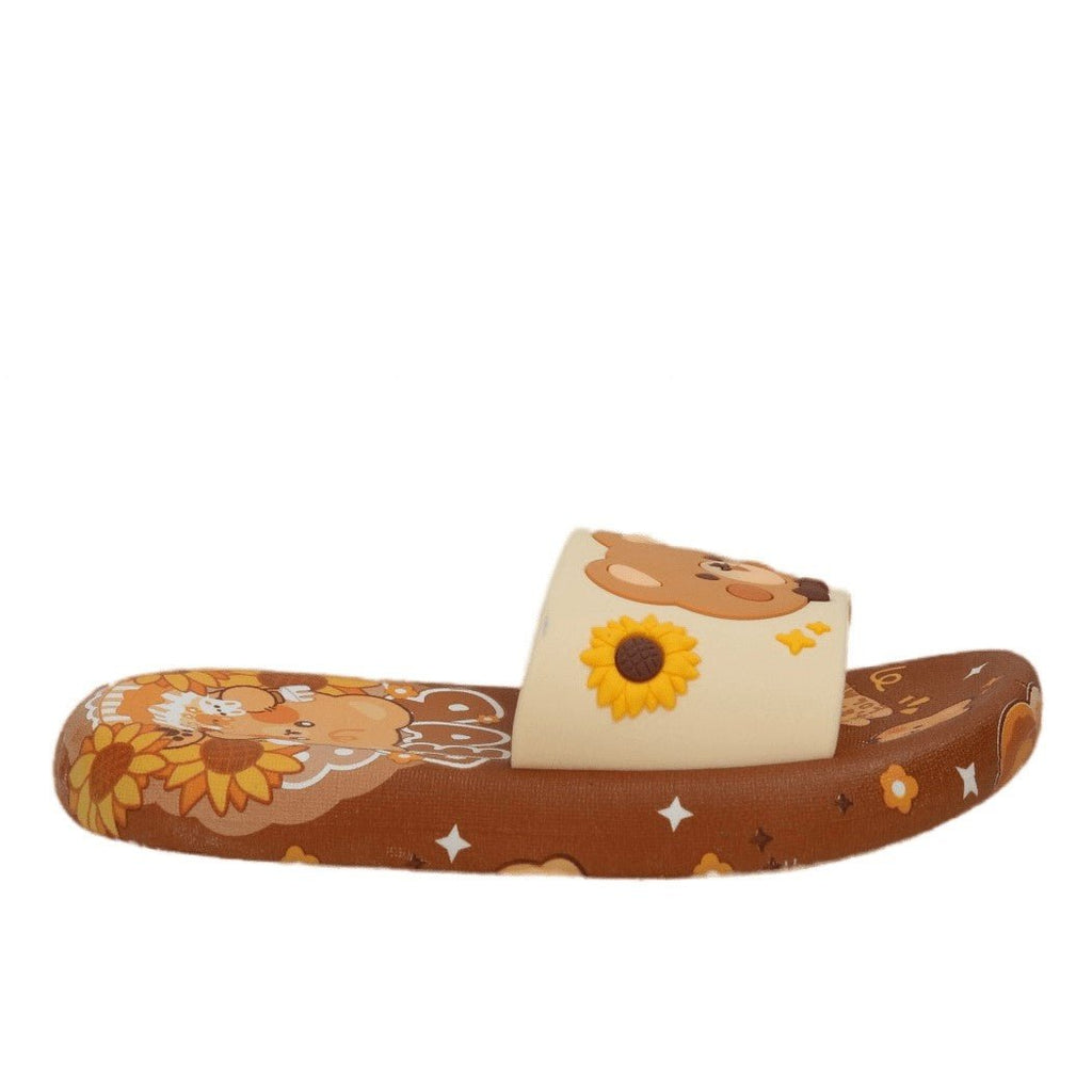 Angled view of brown slides featuring a charming teddy bear and sunflower design for a playful fall style