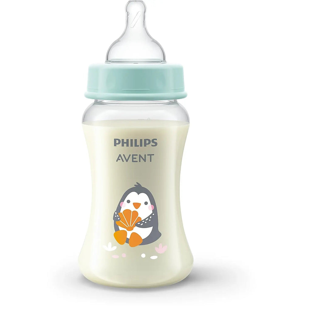 Close-up of Philips Avent SCF061/01 baby bottle with a playful penguin design on the silicone nipple and teal collar
