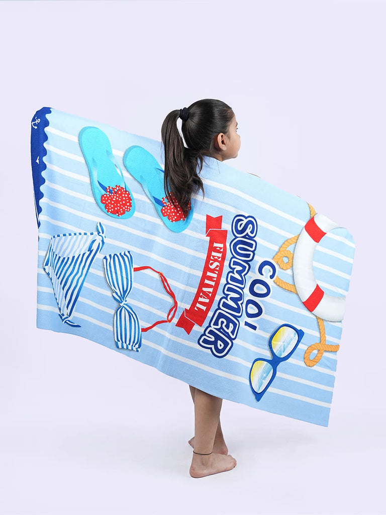 Girl holding Yellow Bee's blue and white nautical summer towel with beach festival design.