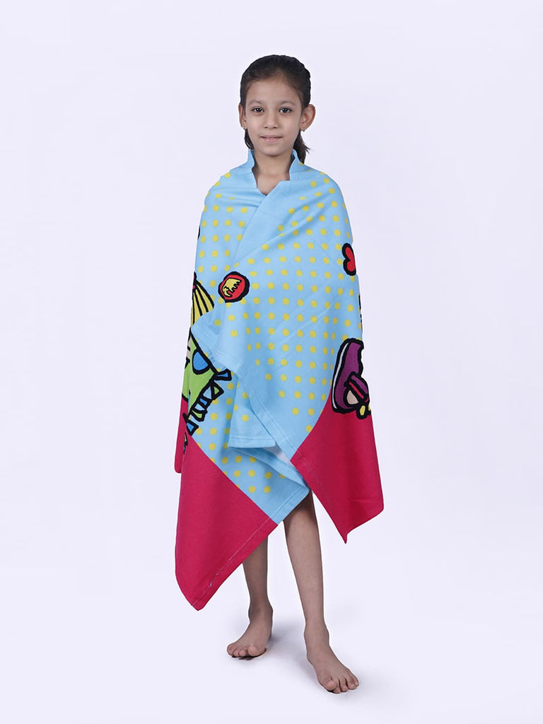 Young girl wrapped in a Yellow Bee Beach Girl Print Towel, showcasing the size and design.