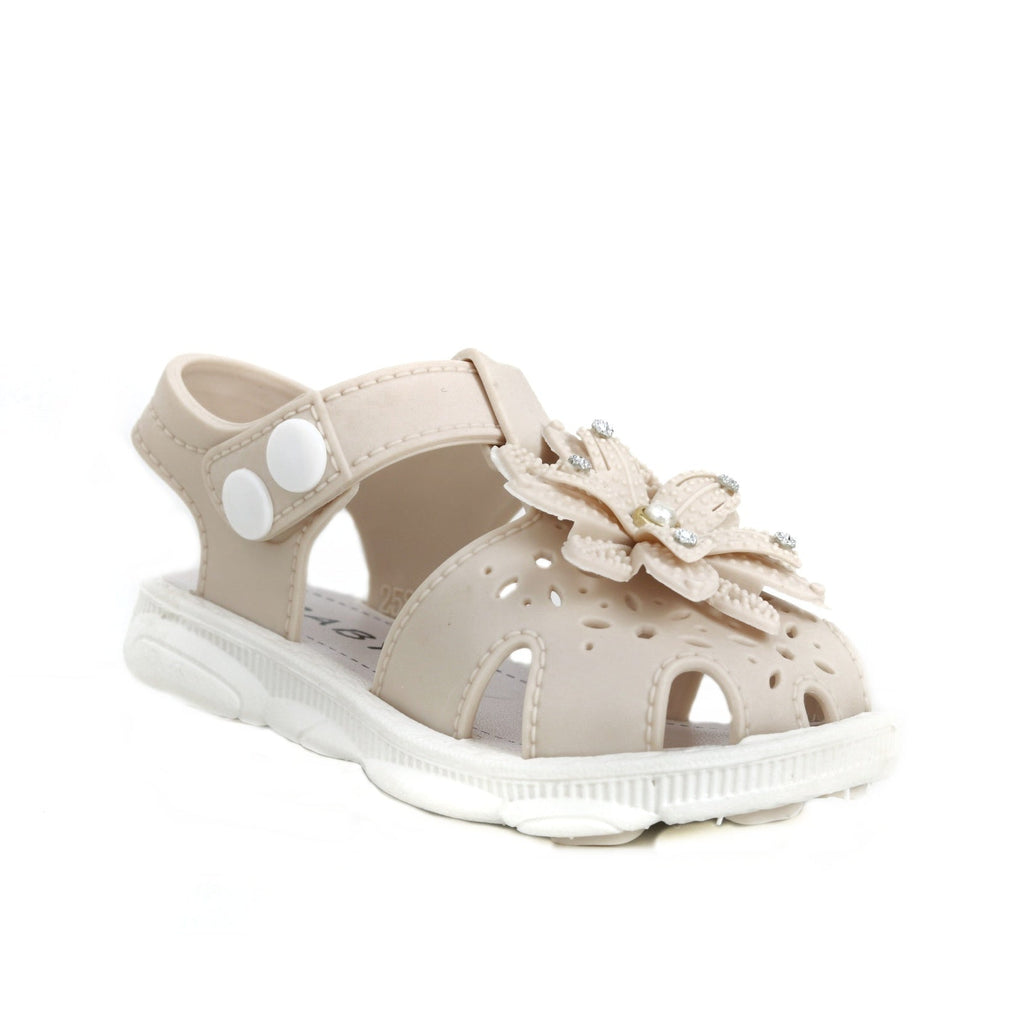 Single beige sandal with flower details and velcro strap
