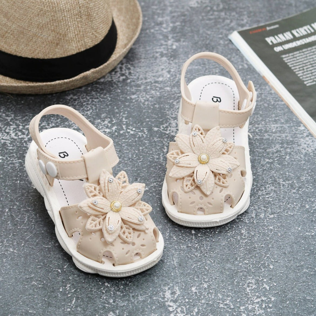 Pair of beige flower embellished children's sandals