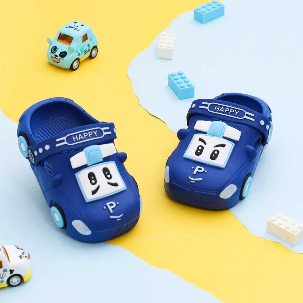 Blue car pattern clogs for boys by Yellow Bee with playful background.