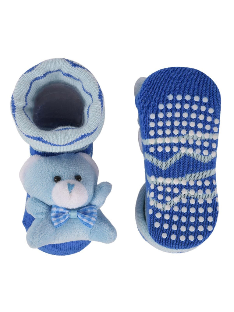 Side view of blue striped teddy bear socks with plush toy and soft ribbed cuff