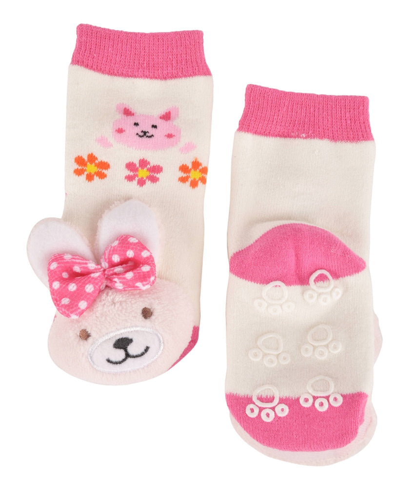 Back view of toddler socks with bunny stuffed toy and anti-slip dots.