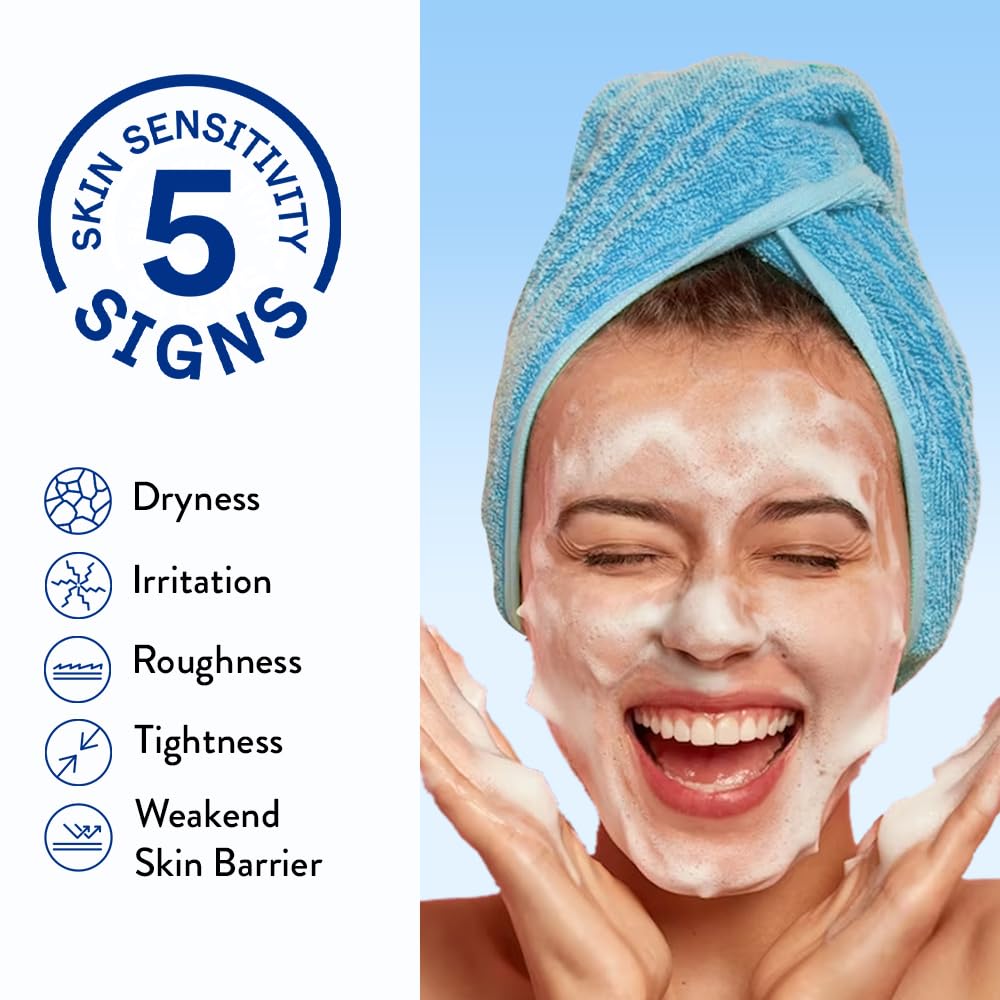 Happy woman with a face full of cleansing foam, demonstrating the five signs of skin sensitivity that Cetaphil addresses