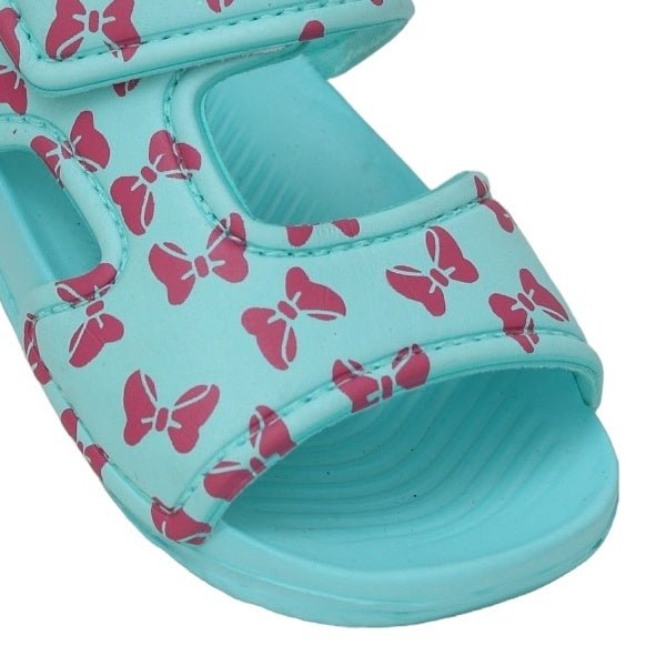 Close-up of a single all-over bow print kid's aqua sandal