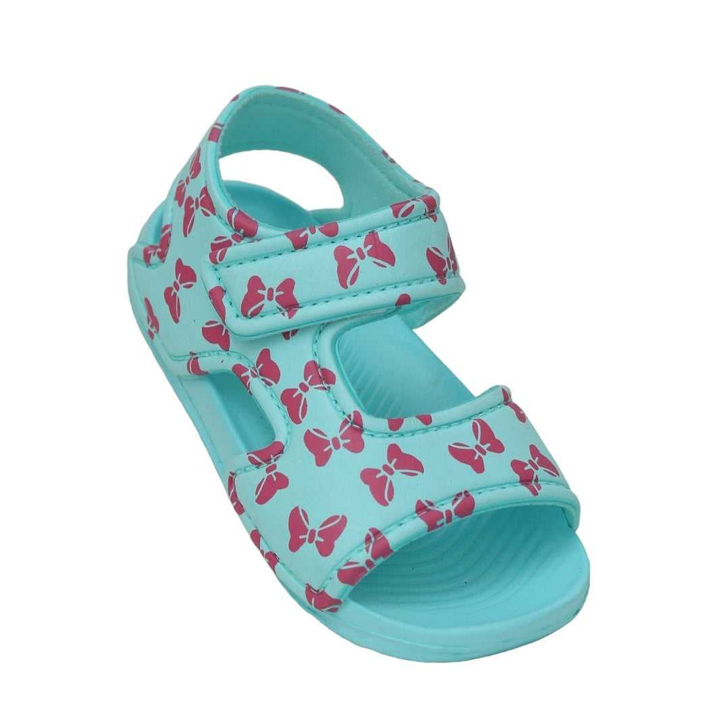 Side view of kid's all-over bow print aqua sandal