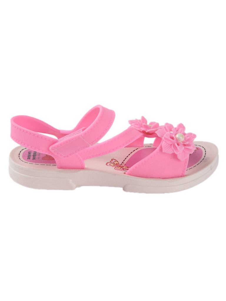 Pair of pink toddler sandals with floral accents and a bow imprint on the insole, displayed on a textured surface