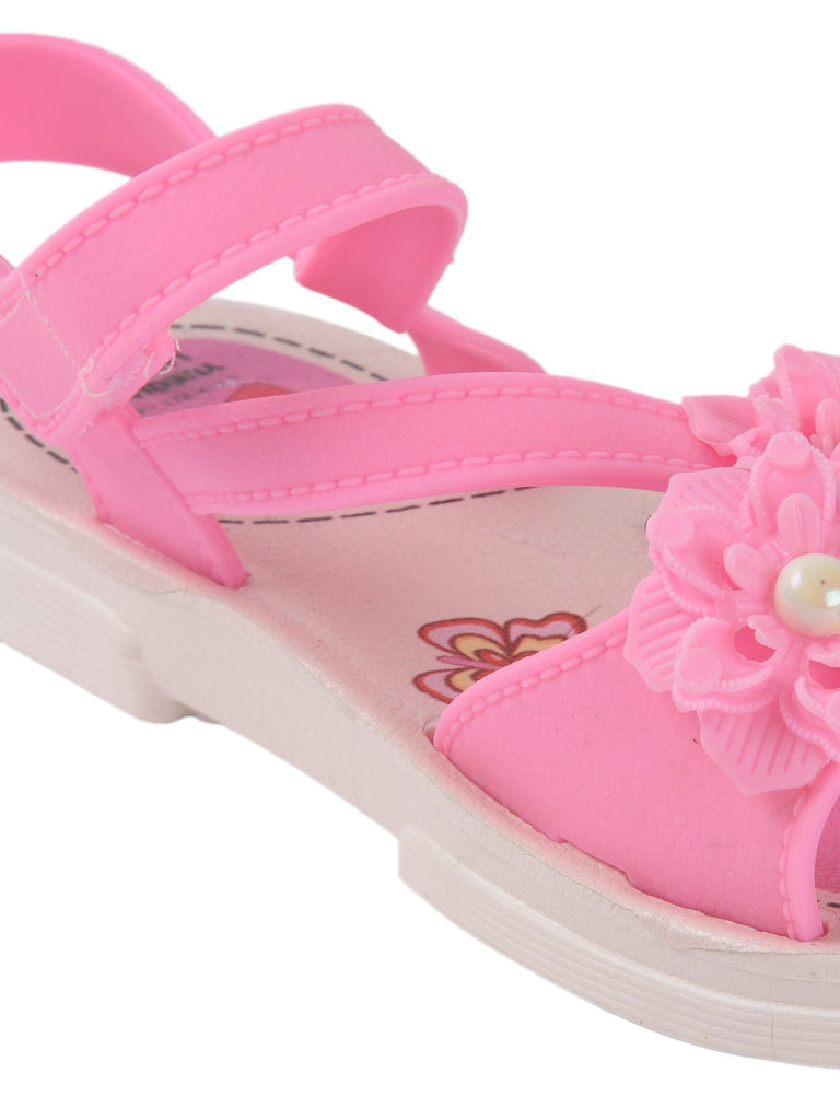 Back view of pink toddler sandals featuring floral details and a secure Velcro strap
