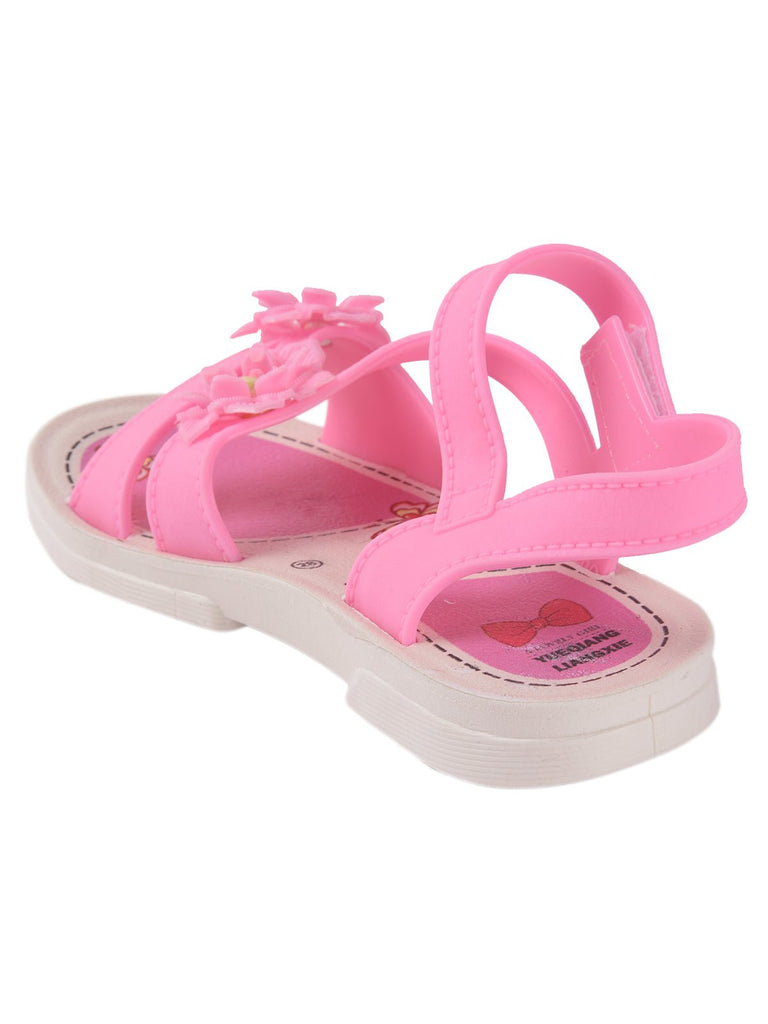 Vibrant pink toddler sandal with flower embellishment and comfortable strap support 